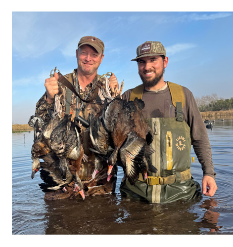 hunters and whistling ducks
